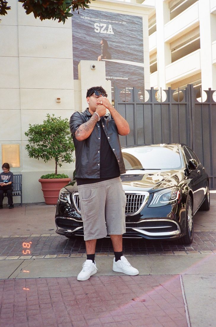 Harman 2x in front of a black Maybach in LA
