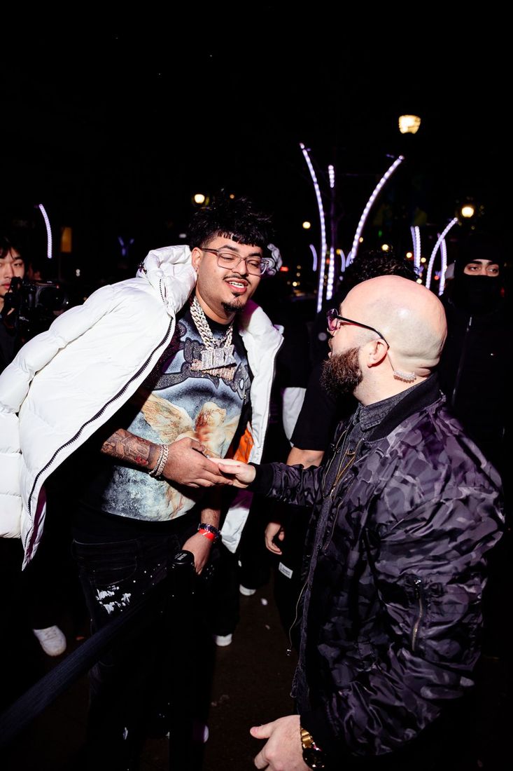 Harman 2x talking with the owner of RARE nightclub before a show
